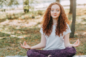 Woman Meditating about being Happy